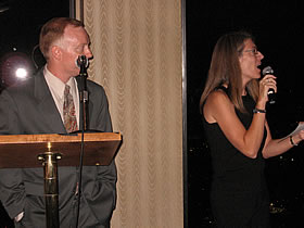 Live auctioneers from InterActive theater, Wes Edmondson and Angela Foster